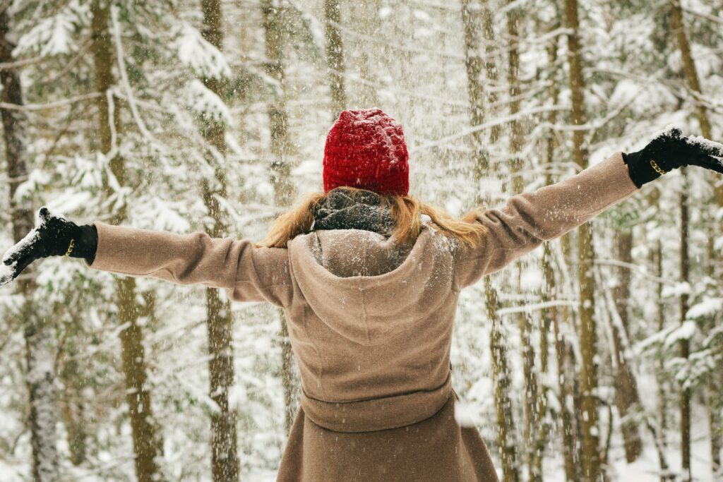 How to prepare for a frugal winter 
Woman in a snowy forest