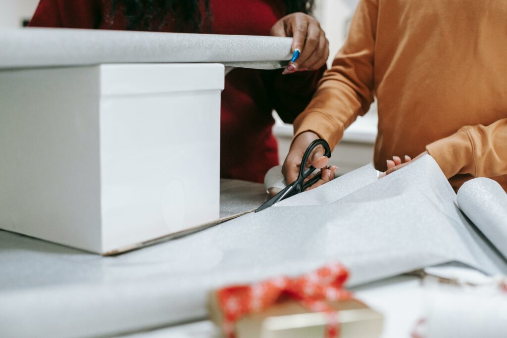 Christmas gifts people actually want 
People wrapping gifts