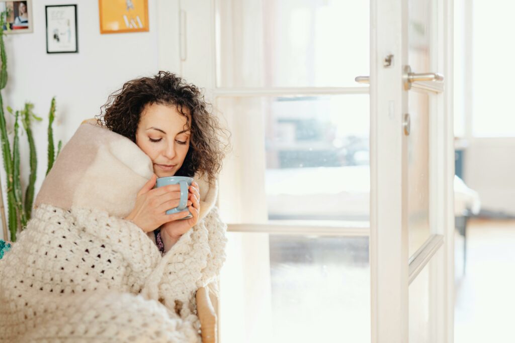 Will there be any payments made this winter to help with energy bills?  
Woman at home cold